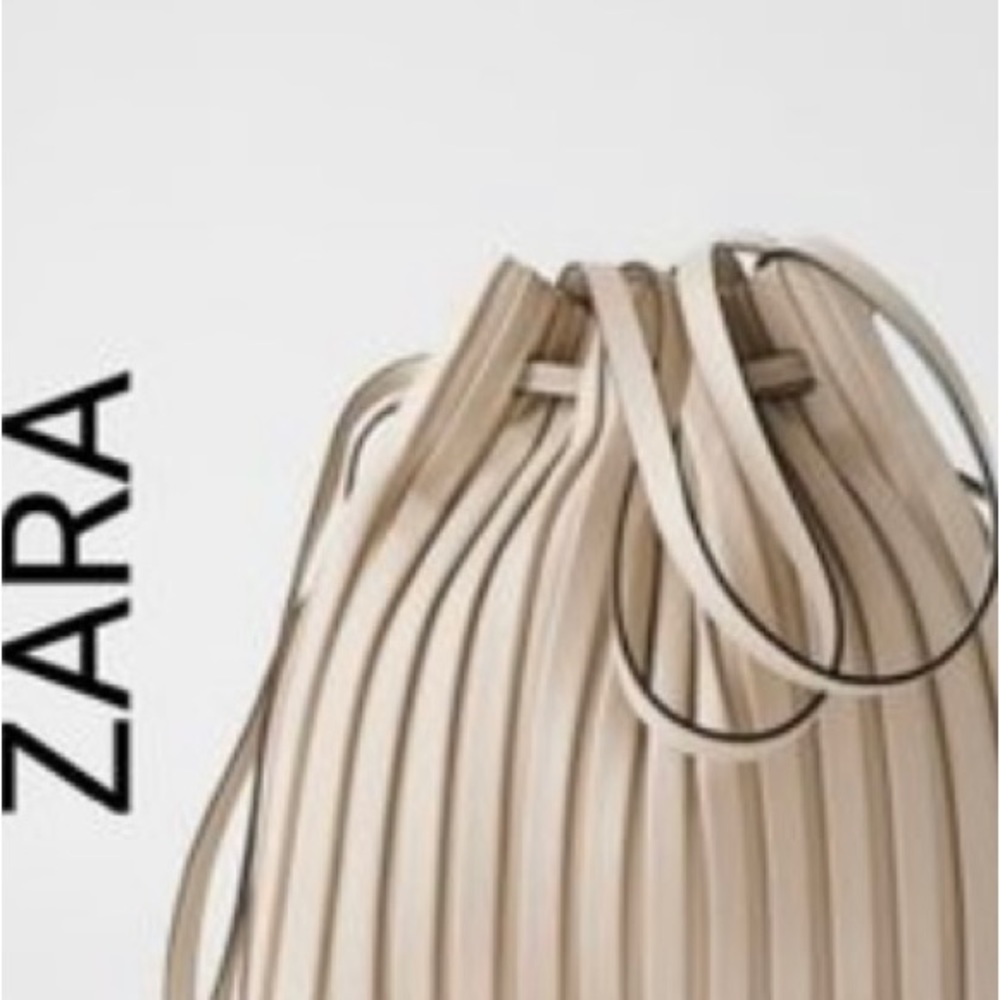 Zara Nude Bucket Bag with adjustable cinch and magnet close handle and strap